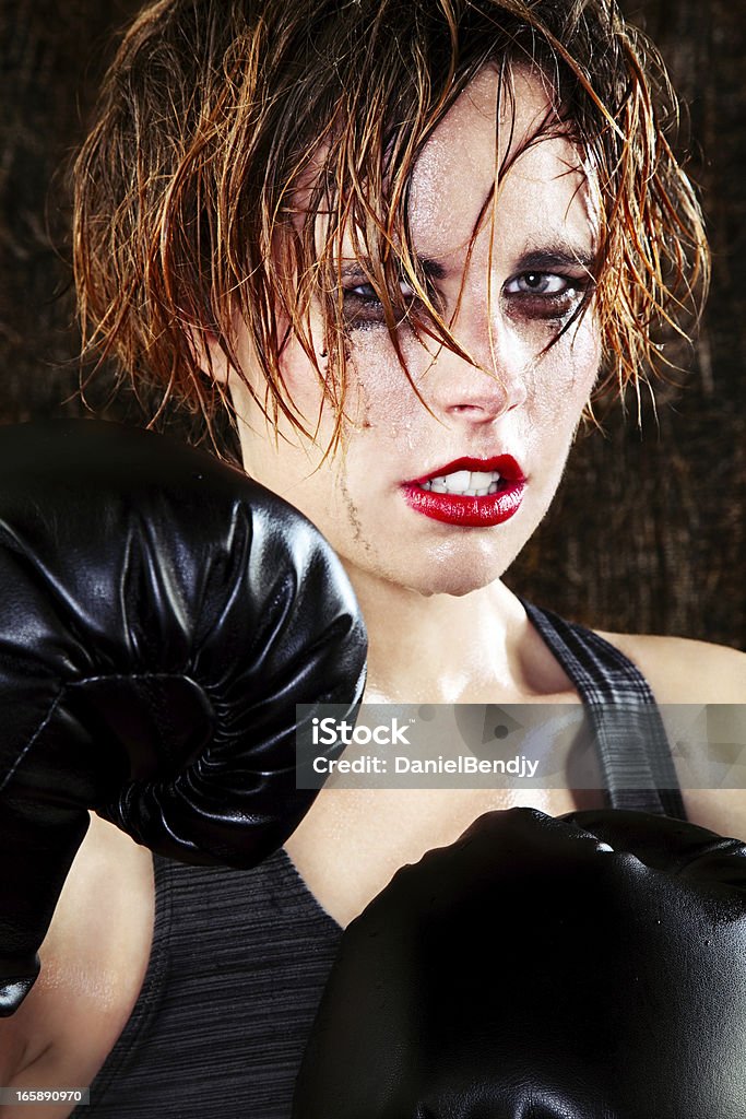 Female Boxer Female boxer with sweaty messy makeup. Sweat Stock Photo