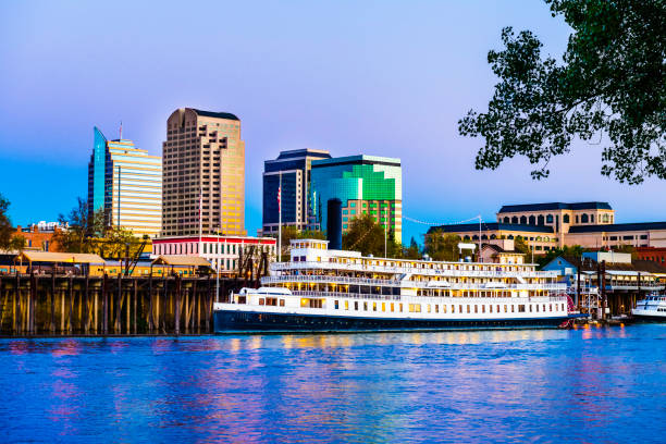 Sacramento skyline and riverfront at dusk