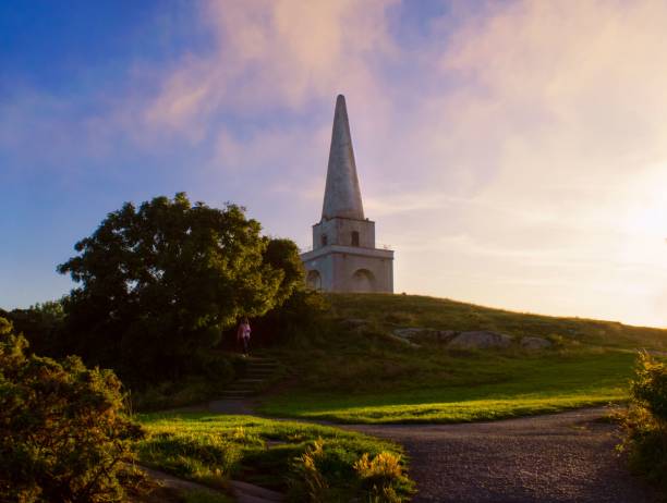 istock the monument is next to an empty path leading to a grassy field 1658920911