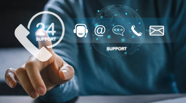 istock Hand of call center 24 hours support services, contact us, email, address, operator, customer, suppor, phone agen, live chat, worldwide nonstop, customer support hotline.Care and consulting client 24hr 1658931383