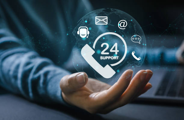 istock Hand of call center 24 hours support services, contact us, email, address, operator, customer, suppor, phone agen, live chat, worldwide nonstop, customer support hotline.Care and consulting client 24hr 1658931390