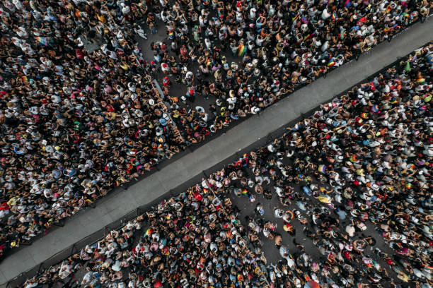 Aerial shot of people at a concert Aerial shot of people at a concert city zoom out stock pictures, royalty-free photos & images