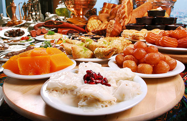 Desserts (Click for more) Dessert Backgrounds (Traditional Turkish Desserts- Baklava, Tulumba, Güllaç, Sütlaç, Lokma, Kabak Tatlısı) middle eastern food photos stock pictures, royalty-free photos & images
