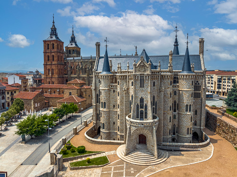Episcopal Palace of Astorga, is a building by Catalan architect Antoni Gaudi in Astorga, in the background the Saint Maria Cathedral, Spain. Aerial view