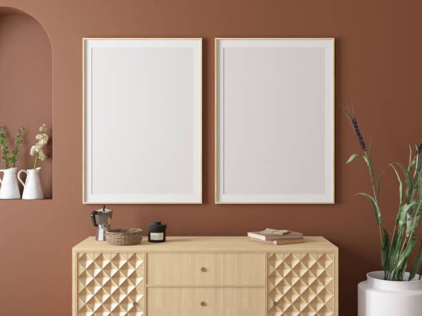 istock Two Mockup Picture Frames on Cozy Room's Beige Wall 1659000006