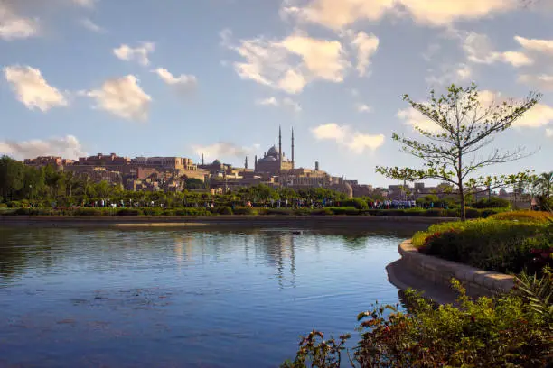 Photo of wide view of Muhammad Ali Mosque from al-Azhar Park Lake, Cairo, Egypt