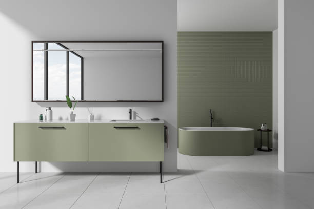 istock Modern hotel bathroom interior with double sink and bathtub, accessories 1659024246