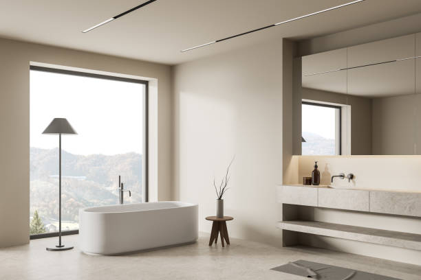 istock Modern bathroom interior with sink, bathtub and panoramic window 1659043357