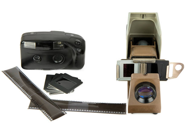 istock Slide projector, slides and film camera isolated on a white background. Collage. 1659051190