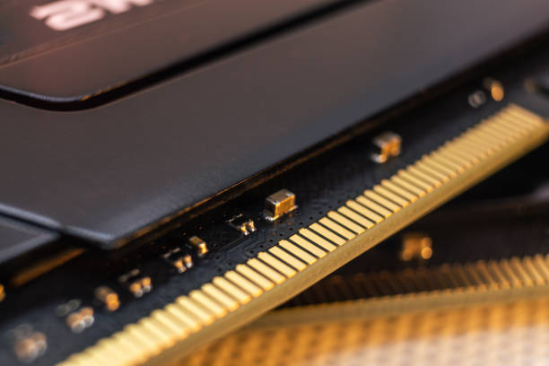 DDR4 DRAM memory module electrical contact macro DDR4 DRAM memory module golden electrical contact macro. Computer RAM chip. Desktop PC memory components motherboard ram slots stock pictures, royalty-free photos & images