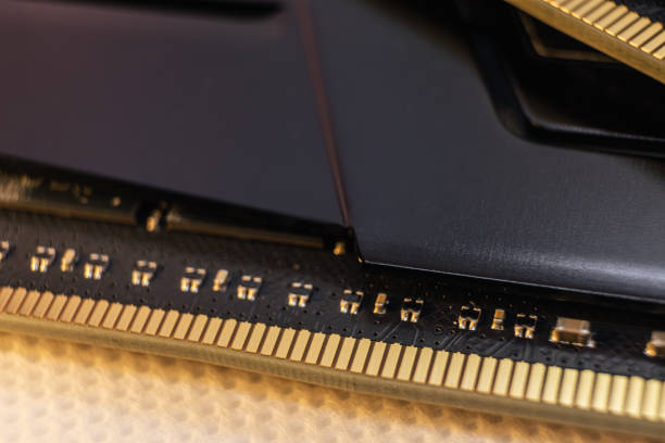 DDR4 DRAM memory module electrical contact macro DDR4 DRAM memory module golden electrical contact macro. Computer RAM chip close-up. Desktop PC memory parts for assemble motherboard ram slots stock pictures, royalty-free photos & images