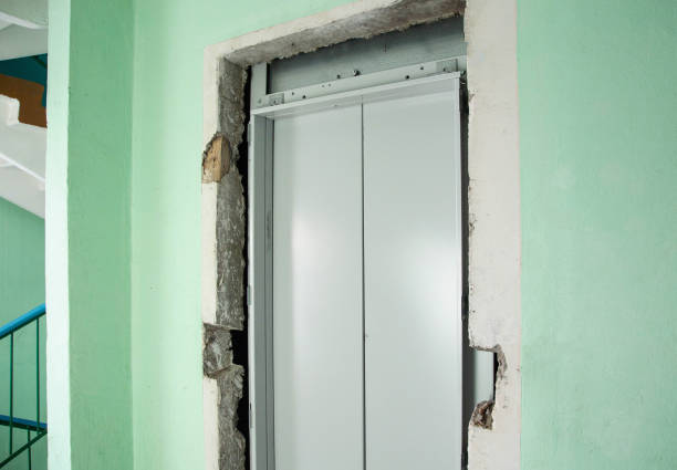Replacing an old elevator and installing a new one in an apartment building