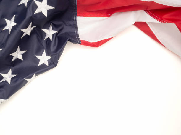 Top view of the American flag on a white background with copy space for text. Top view. Close-up photo