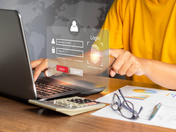 istock Close-up of hand scan fingerprint biometric identity to access personal data in the computer 1659068006