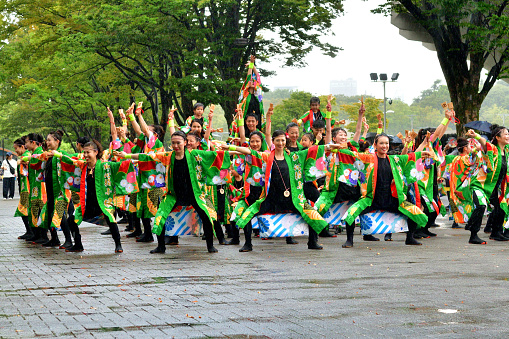 Tokyo, Japan-August 27, 2023:\nHarajuku-Omotesando Genki Matsuri Super Yosakoi was held in Harajuku and Yoyogi Park area, Tokyo, on the last weekend of August this year. Men and women, young and old, performed very vibrant dancing in Super Yosakoi Parade..\nYosakoi is one of the most popular dance festivals in Japan, which originated in Kochi City, Shikoku Island, in 1954, and takes place for four days, including the eve of festival, from August 9 to 12 each year. Ever since, Yosakoi has become popular throughout Japan and Yosakoi festivals are now held all over, including Tokyo, throughout the year.