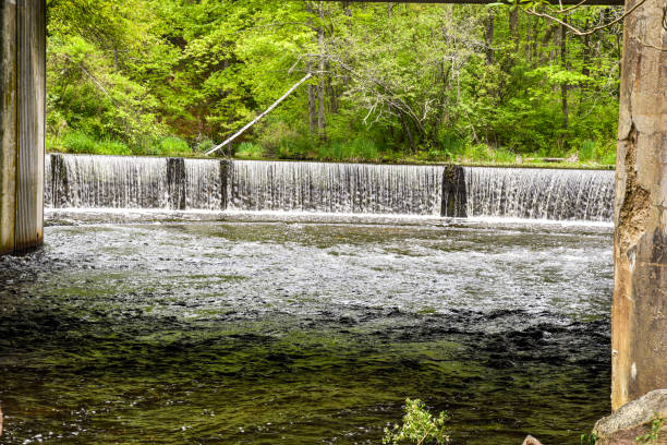 istock Waterfalls trough the bridge 1659080143
