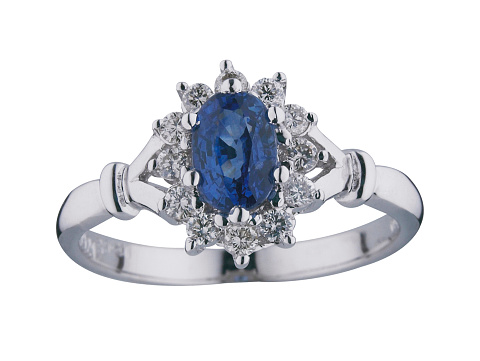 wedding ring  blue sapphire on a white background with clipping path