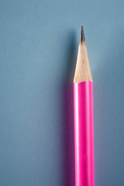 istock pink color pencils against blue background 1659117669