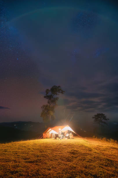istock Tent camping with starry on hill in night sky 1659128963
