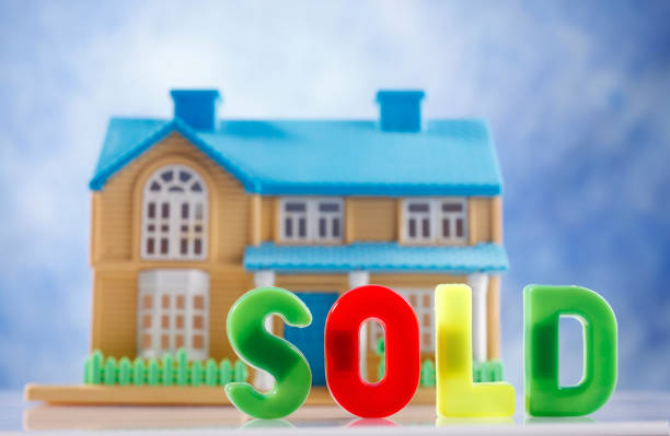 small toy house with the single word sold small toy house with the single word sold for sale sign information sign information symbol stock pictures, royalty-free photos & images