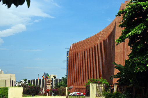 Libreville, Estuaire Province, Gabon: modern building hosting the headquarters of the Economic Community of Central African States (ECCAS / CEEAC) - ECCAS is made of 11 Member States, namely Republic of Angola; Republic of Burundi; Republic of Cameroon; Centrafrican Republic; Republic of Congo; Democratic Republic of Sao Tome and Principe; Democratic Republic of Congo; Gabonese Republic; Republic of Equatorial Guinea; Republic of Rwanda; and the Republic of Chad - The Community promotes and supports the Member States in economic matters and in the establishment of a customs union and the resulting creation of a common market - CEEAC is a largely heterogeneous community compared to other regional associations in Africa, with the former Belgian colonies of Burundi and DR Congo as well as the Spanish-speaking Equatorial Guinea and the Portuguese-speaking island state of São Tomé and Príncipe on one side and the Francophone states on the other - the building originally hosted the Bank of Central African States (BEAC) - boulevard Triomphal El Hadj Omar Bongo - Siège CEEAC-ECCAS.