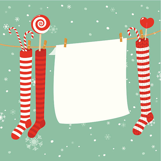 Christmas stockings decoration Christmas stockings decoration with candy and list of paper with copy space. white background sign snow winter stock illustrations