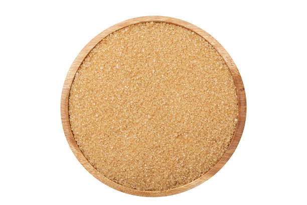 istock Bowl of brown sugar isolated on white background 1659161783
