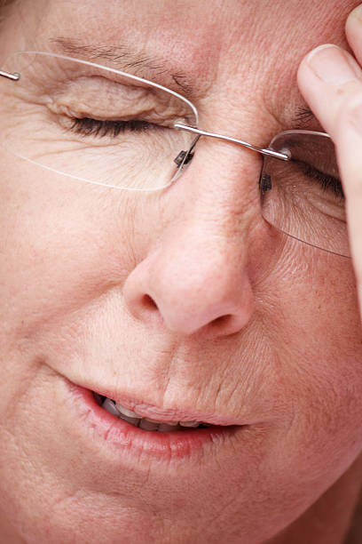istock Mature woman with headache 165917943
