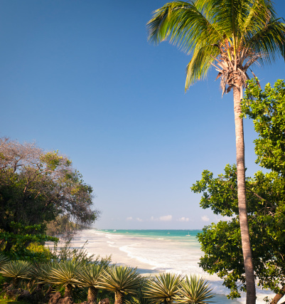 Beautiful white sandy beach and clear crystal water at the west coast of Lombok Island