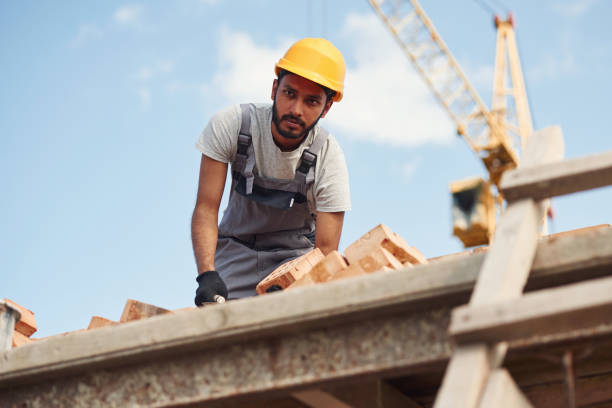 istock Focused on work. Handsome Indian man is on the construction site 1659181375