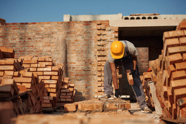 istock Focused on work. Handsome Indian man is on the construction site 1659181903