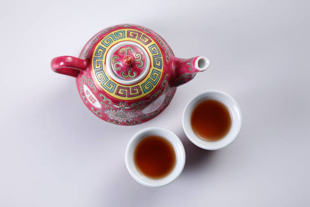 istock teapot with two tea cups with Chinese tea 1659189200