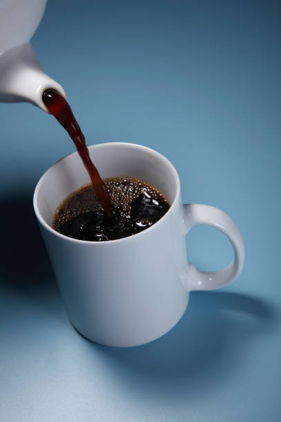 istock pouring hot drink to the mug 1659193164