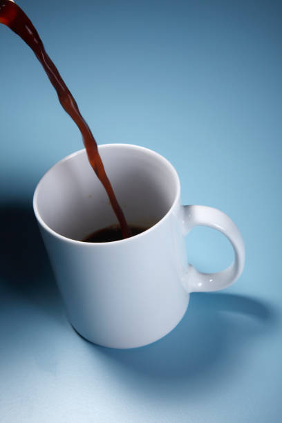 istock pouring hot drink to the mug 1659193545