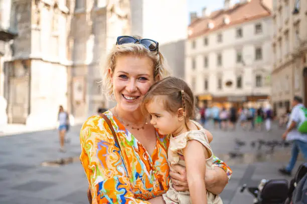 Little girl and her aunt having fun while exploring the city of Vienna