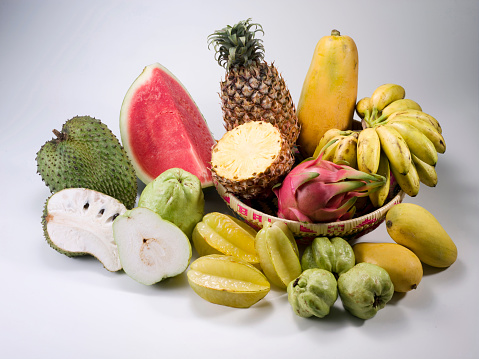 Collection of a ripe tropical fruits isolated over plain background