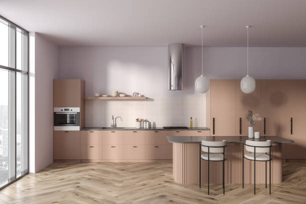 istock Pink and beige kitchen interior with bar 1659238335