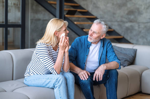 istock Sad middle age couple overcome family problems together 1659250048