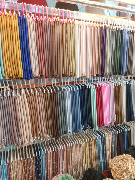 istock Various colored cloth hanging in a shop window 1659252934