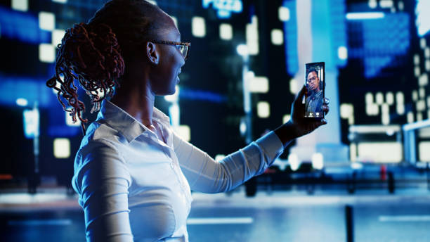 istock Woman in videocall walking on streets 1659270128