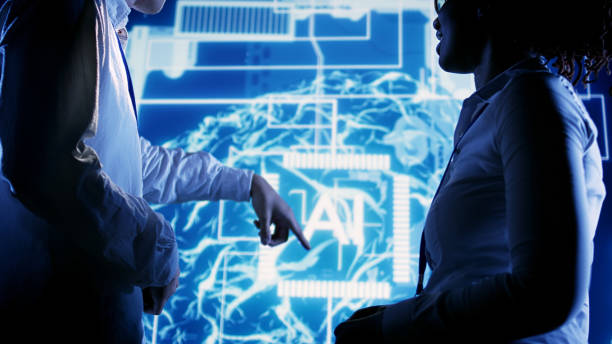 Experts using AI computing simulation African american expert and asian coworker looking at hologram of artificial intelligence human brain simulation. BIPOC IT team members interacting with augmented reality AI visualization artificial intelligence consulting companies stock pictures, royalty-free photos & images