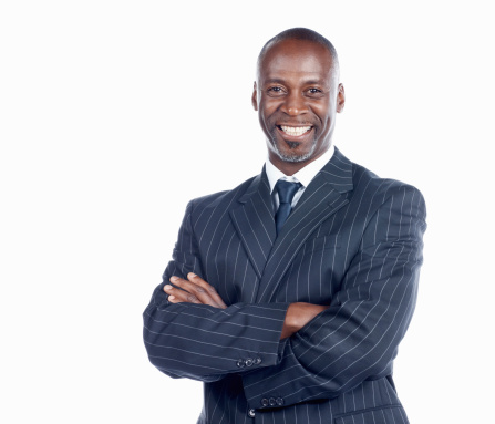 Portrait of African American business man with arms crossed on white background