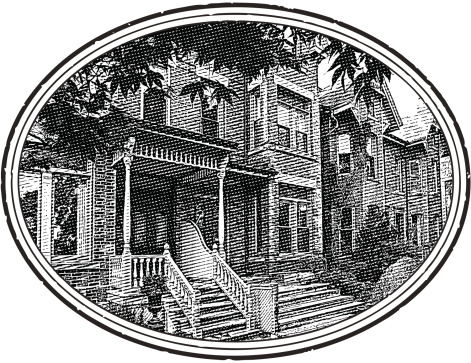 Restored Victorian home in oval frame.