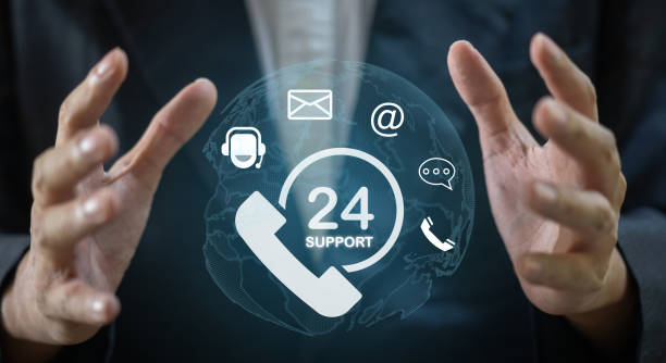 istock Hand of call center 24 hours support services, contact us, email, address, operator, customer, suppor, phone agen, live chat, worldwide nonstop, customer support hotline.Care and consulting client 24hr 1659312462