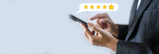istock Human use phone showing give feedback icon satisfaction survey, five star, customer, satisfaction, review, feedback, top service excellent, Quality assurance 5 star, positive, customer service 1659313013