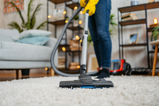 Cleaning carpet by vacuum cleaner