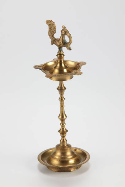 istock Diwali peacock oil lamp stand 1659315913