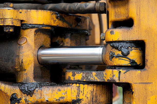 Hydraulic Piston Hydraulic Articulation On Excavator lubrication stock pictures, royalty-free photos & images