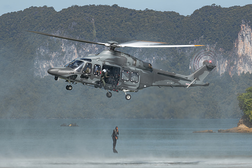 Leonardo AW139 dropping divers in water during a demonstration