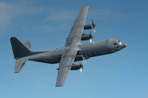 istock Military Cargo aircraft banking 1659332045